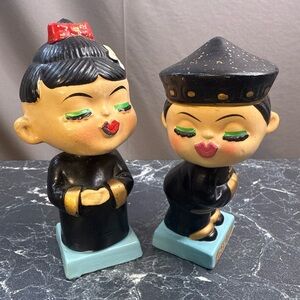 a vintage pair of "Let's Kiss" Japanese bobblehead nodder figurines.